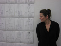 Die Künstlerin Frenzi Rigling neben ihrer Arbeit "Diagramm", 2008, Tusche auf Papier